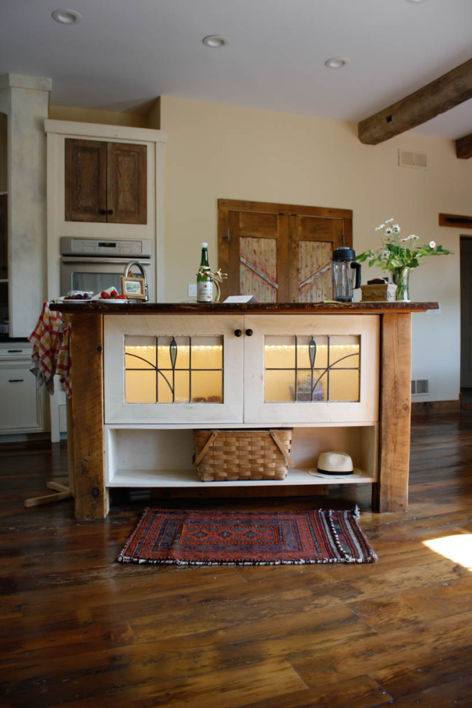 custom kitchen island with rough cut wood