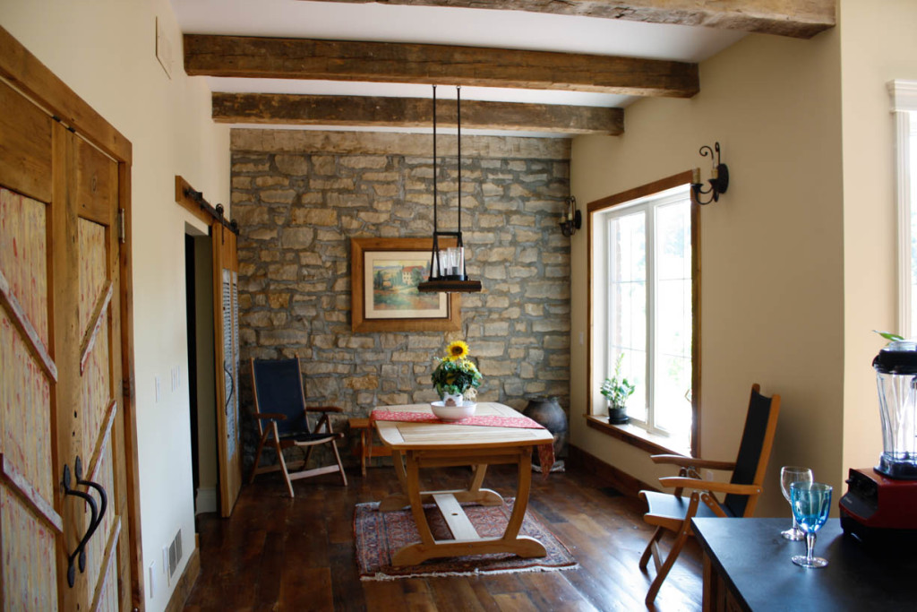 feature stone wall and rough cut beams